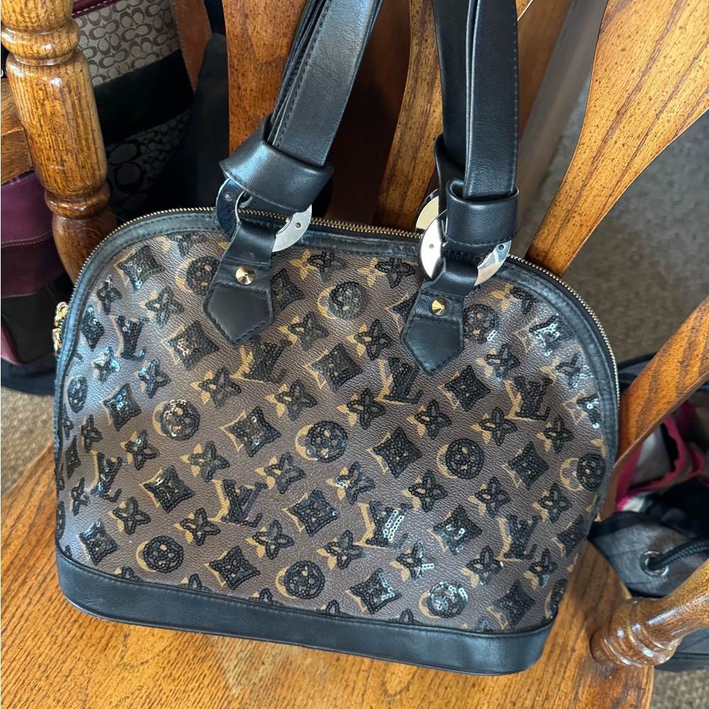 Authentic Louis Vuitton Limited Edition black sequin monogram eclipse Alma purse